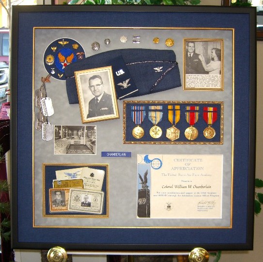 Career Air Force memory box with medals, beret, photographs, ID cards and tags...